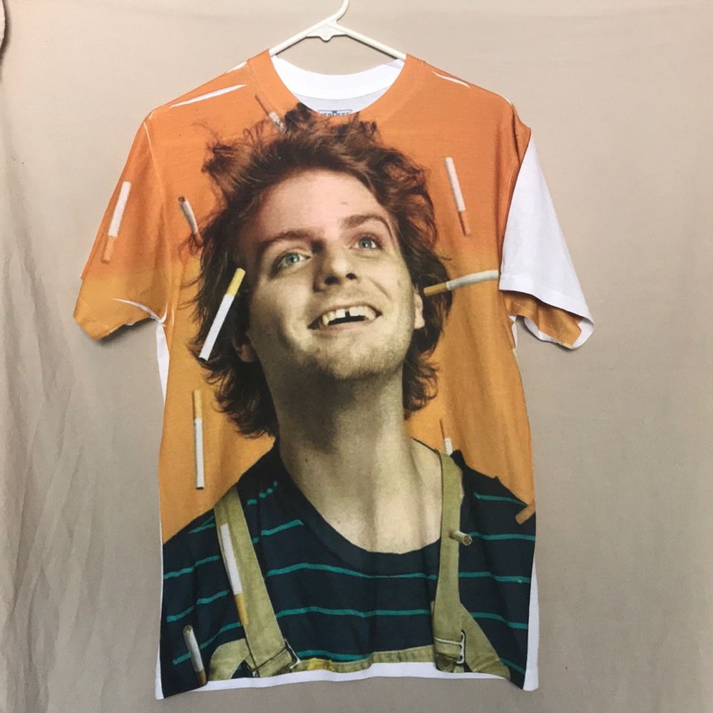 100% Polyester Medium printed tee. (Never worn)